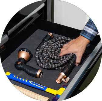 The Copper Hose compact in an easy storage drawer