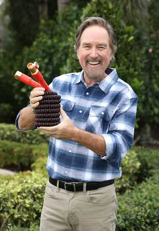 Richard Karn holding Pocket Hose Ballistic