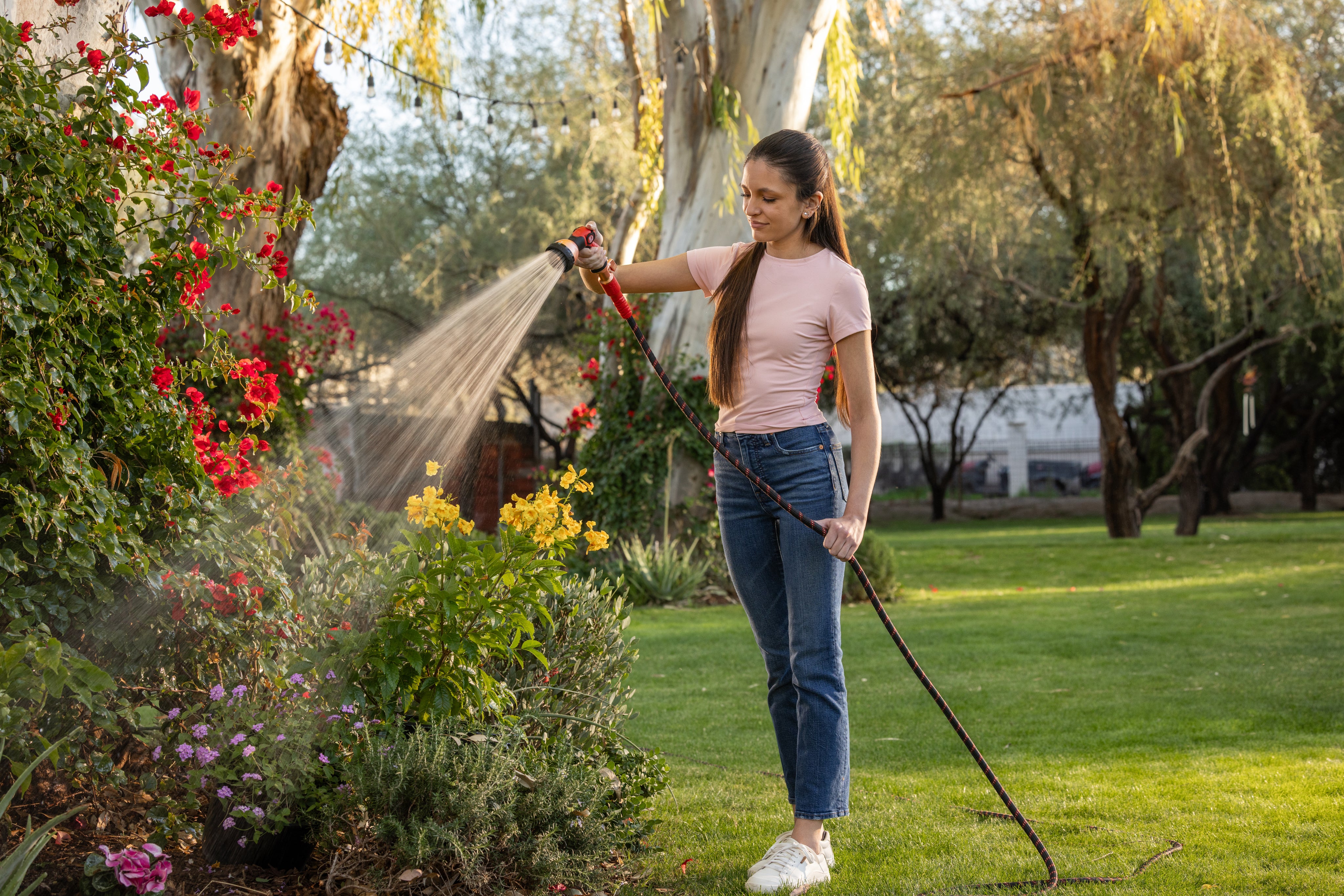 woman watering garden